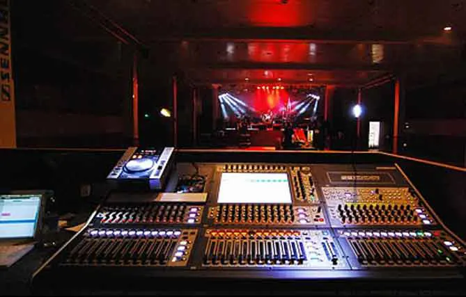 Recording room with control desk and studio